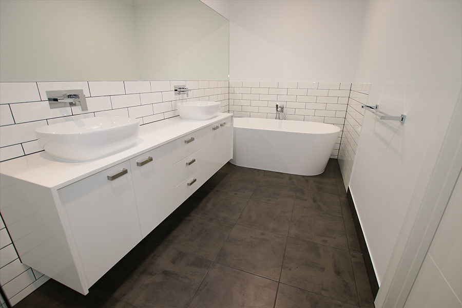 double-vanity-bathroom-with-bathtub